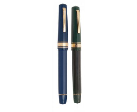 OMAS PARAGON FOUNTAIN PENS "ITALIA 90".Blue and green resin barrels.Nib in 18 Kts gold, tip F.Limited edition.No box.Measurem