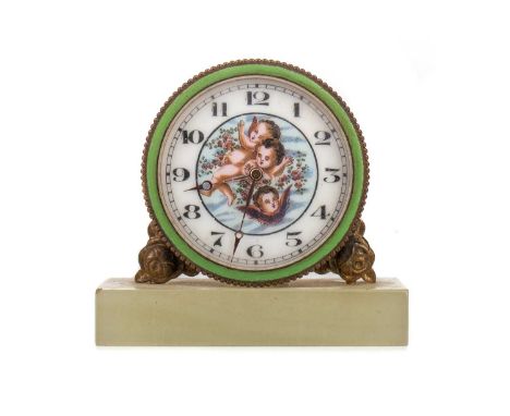 LATE 19TH CENTURY TRAVELLING CLOCK,likely French, the circular dial painted with three putti and set with Arabic numerals, br