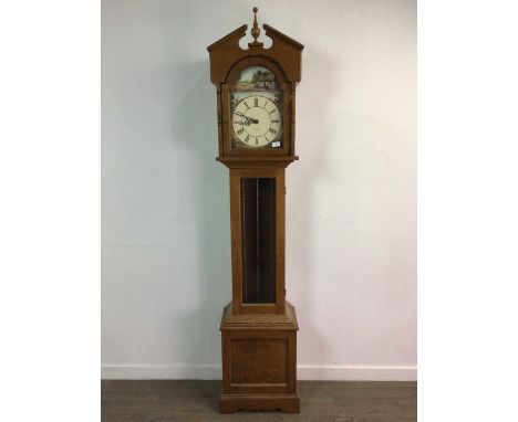 OAK LONGCASE CLOCK OF GEORGIAN DESIGN BY R.A. HARTSHORNE OF WALSALL,with turned finial and broken swan neck pediment, the dia