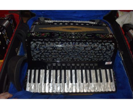 A Vignoni Watkins Philharmonic 1 Super-M piano accordion, with midi output, in plush lined, croc style case