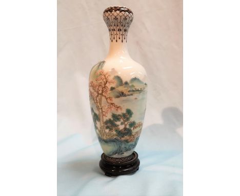 A Chinese Republic period baluster vase decorated in polychrome with a landscape, character text to the reverse, red seal mar