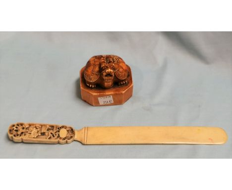 A late 19th / early 20th centuryChinese ivory seal surmounted by a tortoise with dragonhead, length 3"; a 19th century ivory 