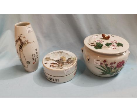 A Chinese covered jar decorated in the famille verte manner with flowering branches, character text to lid and body, diameter