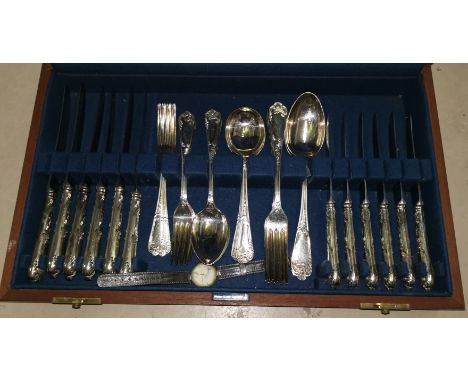 An ornate canteen of silver plated cutlery by Walker &amp; Hall, 6 setting in fitted box; a ladies Tissot quartz watch 