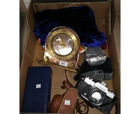 An Art Deco style mirror clock; 2 cameras; a set of gaming chips, boxed; 2 cushion covers 