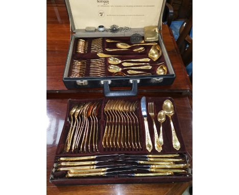 A gold plated canteen of cutlery in fitted case; 2 1930's marcasite brooches; a gilt compact with lipstick compartment etc 