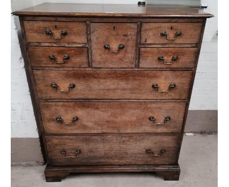 A 19th century oak 'Scotch'  chest of 3 long, 4 short and 1 hat drawers, with swan neck handles, on bracket feet, width 37.5"