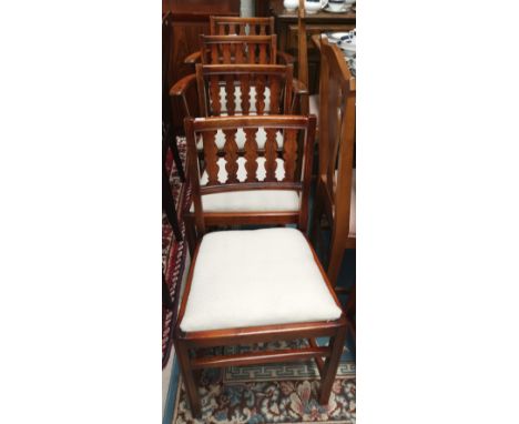 A set of 6 (4 plus 2) country style Ercol dining chairs 