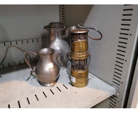 A THOMAS WILLIAMS miner's lamp, 2 pewter jugs and a pair of antler handled carvers 