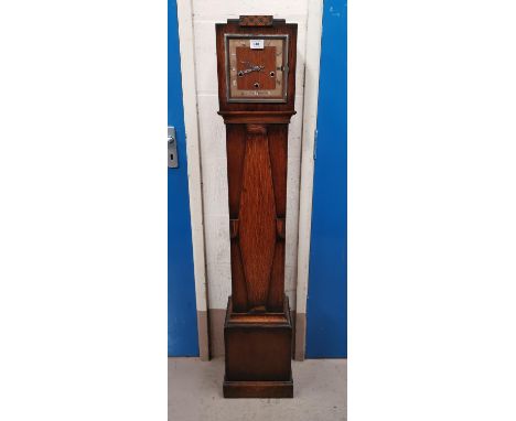 A 1930's oak cased Westminster chiming granddaughter clock 