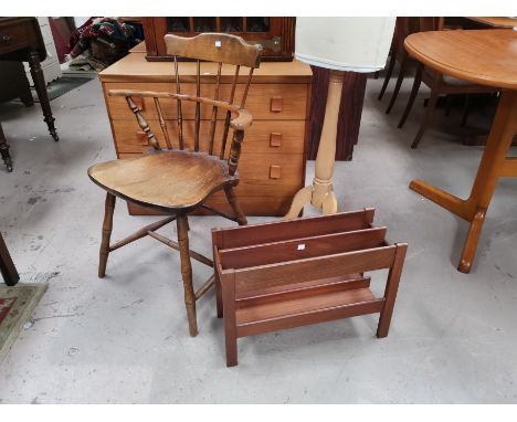 A Windsor stick back arm chair and a teak magazine rack