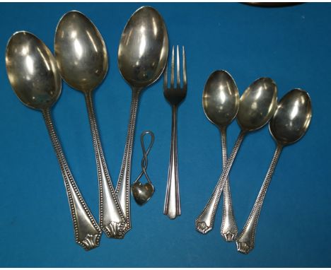 A part set of 3 silver dessert spoon s and 3 teaspoons, with beaded borders; a small fork and heart shaped salt spoon, variou