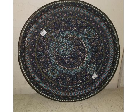 A Syrian Damascus enamel on coppr tray decorated in blues and pinks
