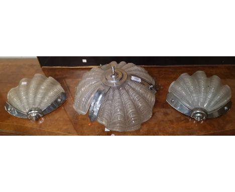 An Art Deco 3 piece light garniture in glass and chrome, comprising triple shell pendant chandelier, and a pair of matching w