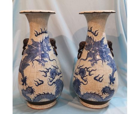 A Chinese pair of large crackle glaze vases decorated in blue with dragons, impressed seal to bases, height 18.5"