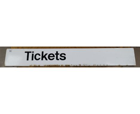 An enamel white railway tickets sign