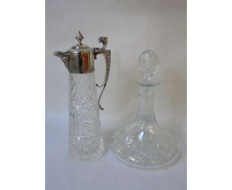 Cut glass ships decanter and cut glass claret jug with plated top