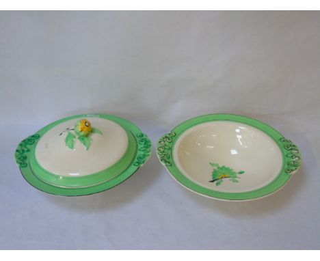 A pair of art deco Clarice Cliff tureens and covers in green and Ivory plus a Clarice Cliff tureen with matching serving dish