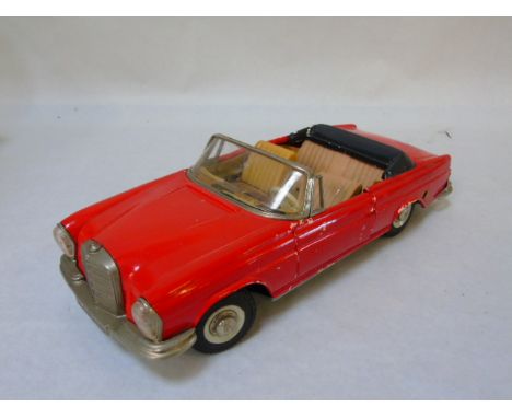 A Schuch tin plate clockwork Girato 4000 model car