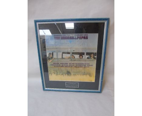 A friend and glazed copy of farewell to the first golden era by the mamas and the papas and signed by the band