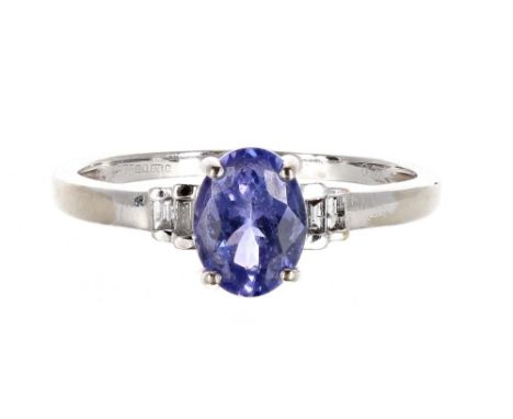 Tanzanite and baguette diamond set 9ct white gold ring, the oval tanzanite 1.40ct approx, diamonds 0.07ct,  8mm, 2.2gm, ring 