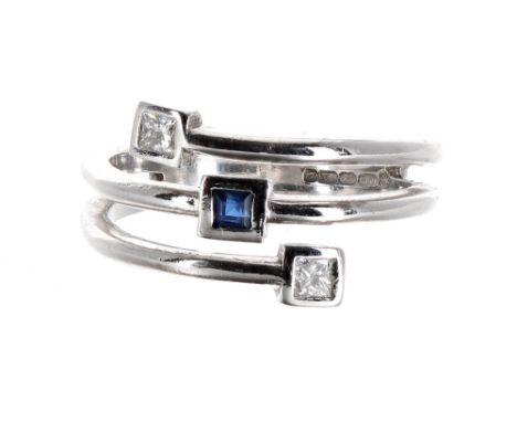 18ct white gold sapphire and diamond princess-cut three stone wrap-around ring,  4.4gm, width 10mm, ring size J/K 