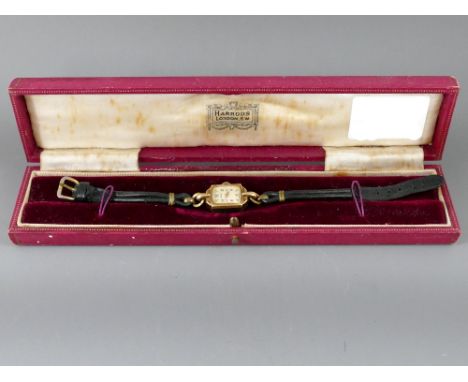 Rotary 1950s 9ct gold cased lady's wristwatch, 15 jewels, leather strap, 14mm; within a Harrods vintage case