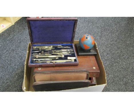 A collection of items, to include a nickel plated geometry set, writing related items, leather bridge case and a rosewood wor