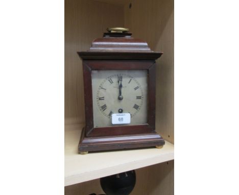 Mappin and Webb Ltd, London, an Edwardian mantel clock, the mahogany caddy top case enclosing an eight day movement faced by 