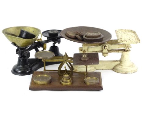 A collection of scales, to include brass and mahogany letter scales, kitchen scales, etc.