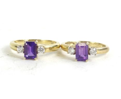 Two 9ct gold dress rings, each set with amethyst and cz stone shoulders, 5.2g all in. 