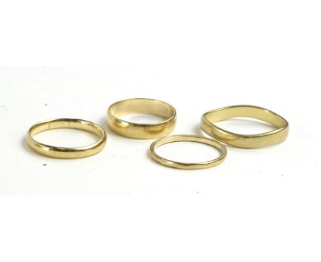Four 9ct gold wedding bands, to include some of very thin design, one misshapen, 6.9g.