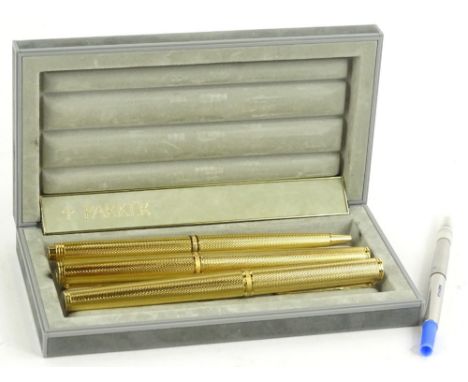 A Parker Premier collection gold plated pen set, comprising fountain pen, a ball point and propelling pencil, in original cas