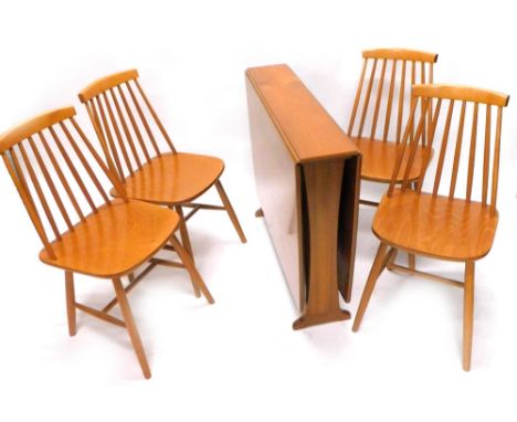 A 1980s/90s teak rectangular drop leaf table and four Ercol style stained beech dining chairs.