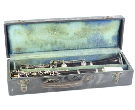 An early to mid 20thC clarinet by J R Lafleur and Son, with silver plated mounts, indistinct makers stamp number 38865, in a 