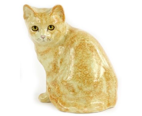 A Winstanley ceramic model of a ginger cat, scripted mark to underside and number 4, 22cm H.
