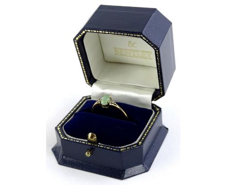 A Brooks and Bentley 9ct gold dress ring, entitled The Jewel of The Orient Jade and Diamond Ring, with certificate of authent