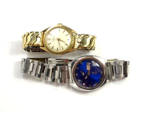A Seiko 21 dual automatic stainless steel gents wristwatch, boxed, a Poljot gold plated gents wristwatch, (2).