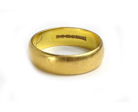 A 22ct gold wedding band, of plain design with inscribed interior Jim 3.3.62 G.Loops, 6.7g.