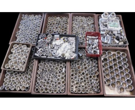 A large quantity of tools, mainly sockets and socket attachments.