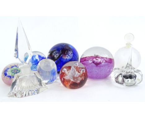 A collection of glass, to include Caithness paperweights, Lalique style scent bottle and stopper etc.
