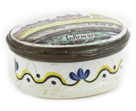 A late 18th/early 19thC Staffordshire type enamel patch box, the lid decorated 'A present from Manchester' and with a scene o