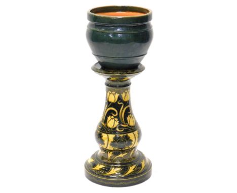 An Art Nouveau style pottery jardiniere, indistinctly stamped, 71cm H overall
