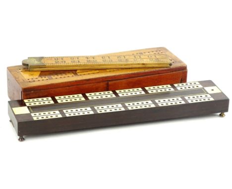 A 19thC rosewood and ivory inlaid cribbage scorer, with sliding compartment to underside, an Edwardian mahogany example with 