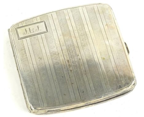A George V engine turned silver cigarette case, engraved with initials JLJ, Birmingham 1924, 4oz.