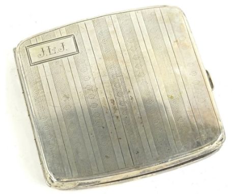 A George V engine turned silver cigarette case, engraved with initials JLJ, Birmingham 1924, 4oz.