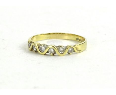 An 18ct gold diamond half hoop eternity ring, with wave design gold centre set with six tiny diamonds, 2.2g all in.