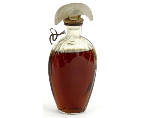 A bottle of vintage Belle Epoque perfume, with cast frosted glass stopper, in the manner of Lalique, sealed with original con