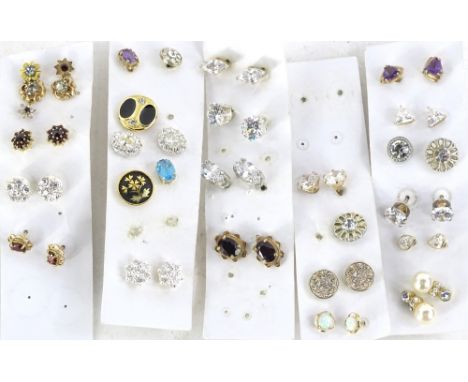 A quantity of earrings, to include 9ct gold garnet set floral cluster earrings, another pair of garnet cluster earrings, aqua