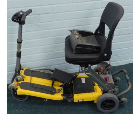 A Luggie folding electric mobility scooter, with charger. (no key)